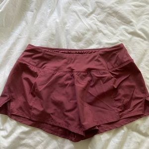 NIKE magenta shorts